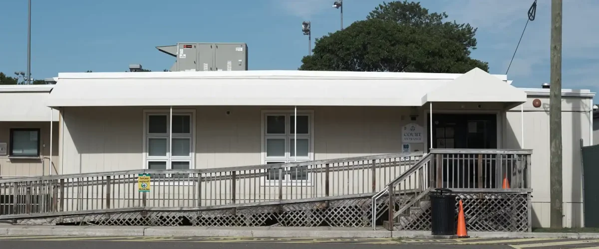 Long Island eviction office with accessible ramp and parking.